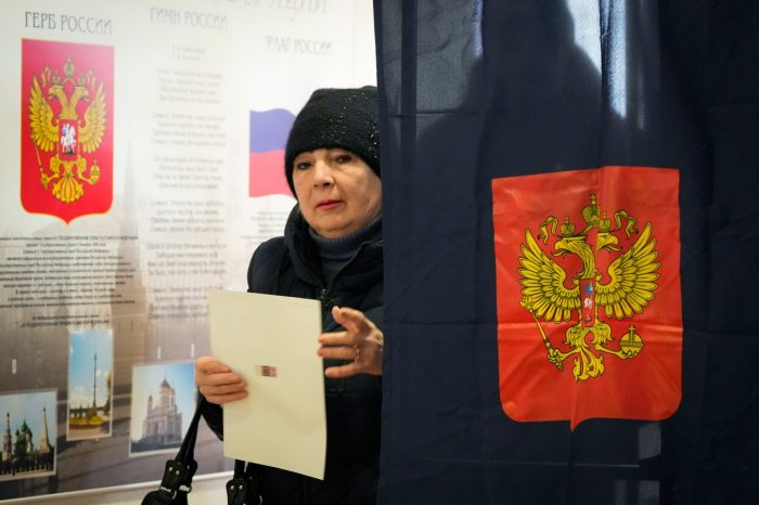 Russians cast ballots in an election preordained to extend President Vladimir Putin's rule