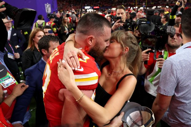 Taylor Swift Passionately Kisses Travis Kelce After Singapore ‘Eras Tour’ Concert in New Video