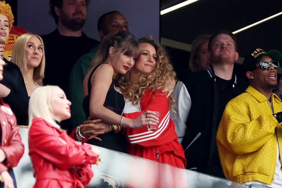 LAS VEGAS, NEVADA - FEBRUARY 11: Rapper Ice Spice, Singer Taylor Swift and Actress Blake Lively hug prior to Super Bowl LVIII between the San Francisco 49ers and Kansas City Chiefs at Allegiant Stadium on February 11, 2024 in Las Vegas, Nevada. (Photo by Ezra Shaw/Getty Images)